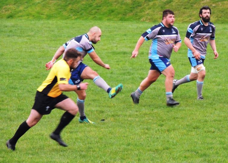 Nick boots a 60-yard penalty